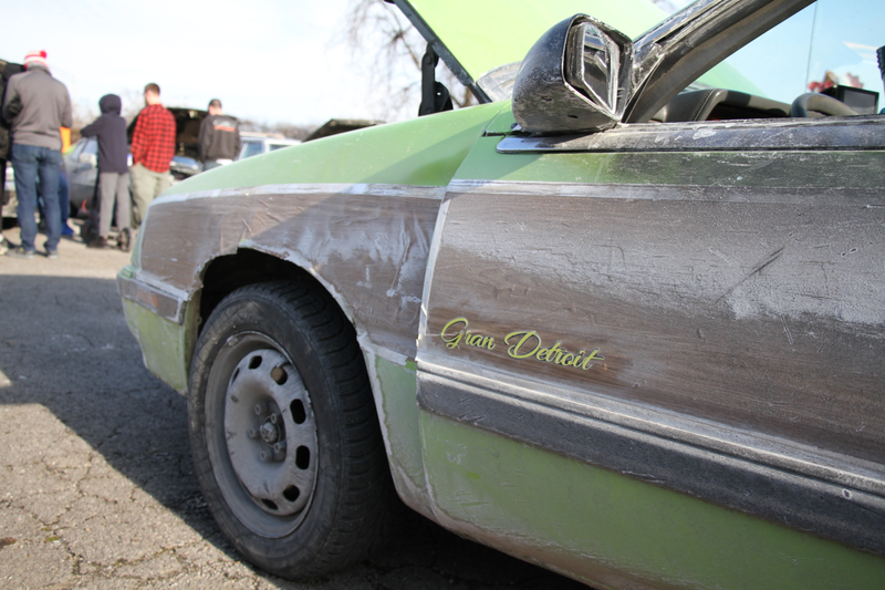 The lone crunched fender from the red car, all covered up in-theme.